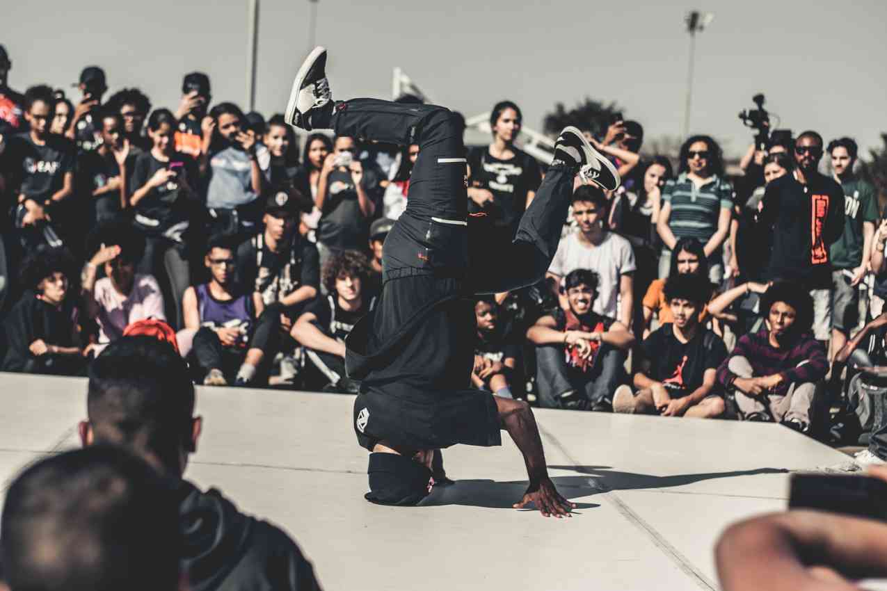 Hip hop dancer performing a dynamic spin
