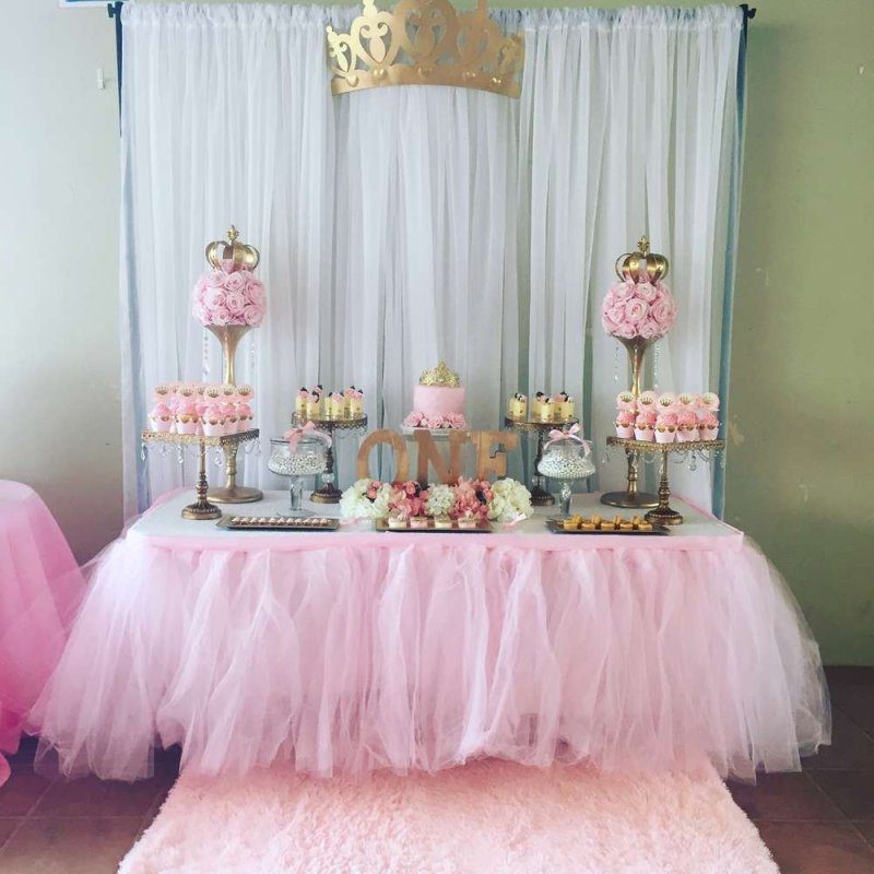 Set up a dedicated dress-up station where the young guests can transform into princesses.