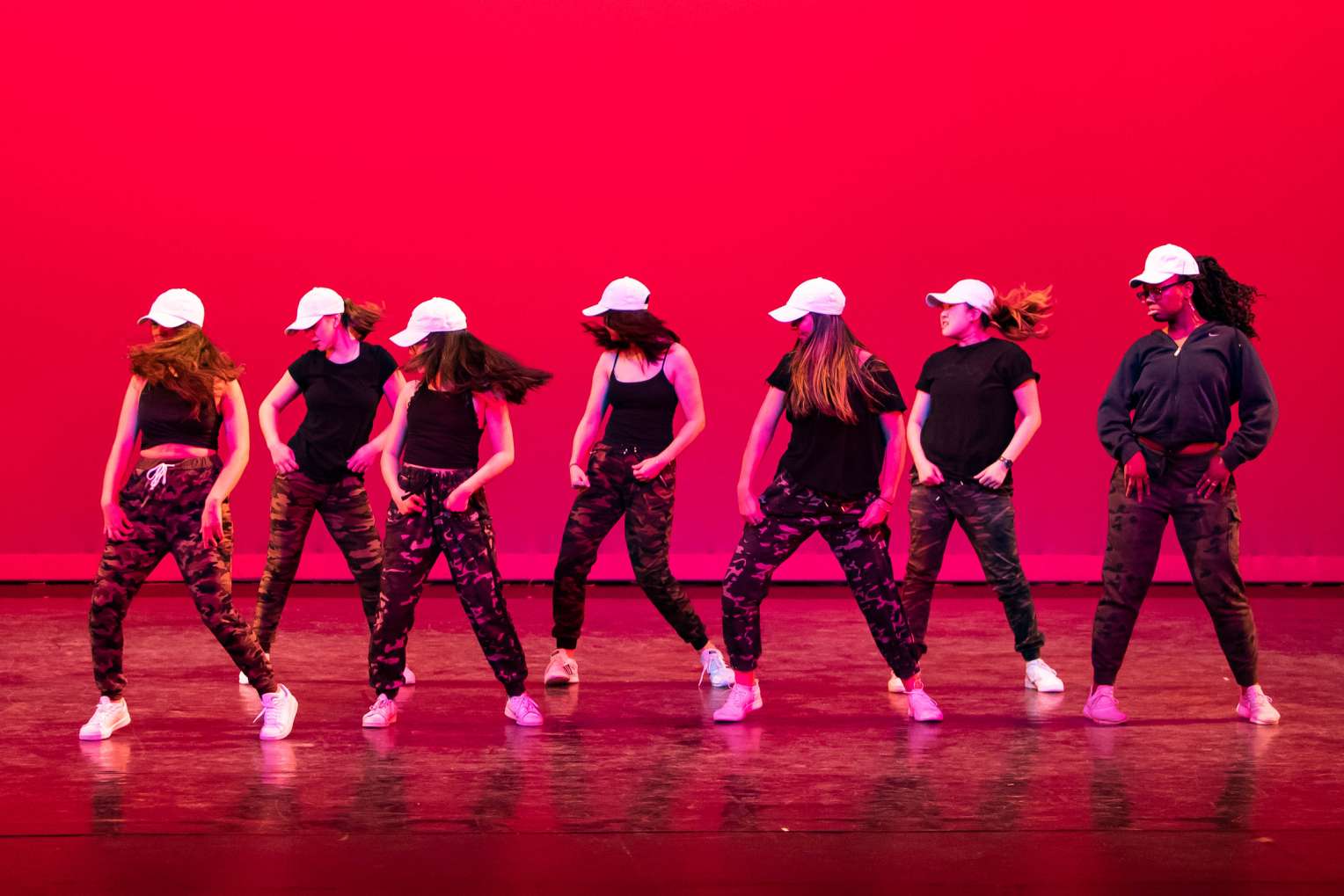 Hip hop dancers in synchronized motion