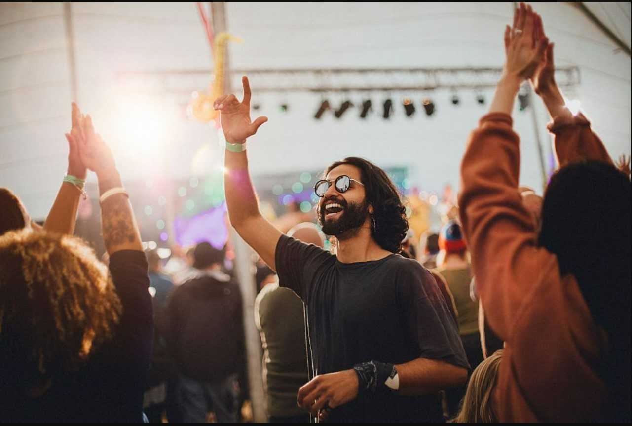 People dancing at a festival themed party